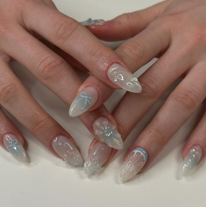 Artificial nail art with floral and decorative elements Bowlift
