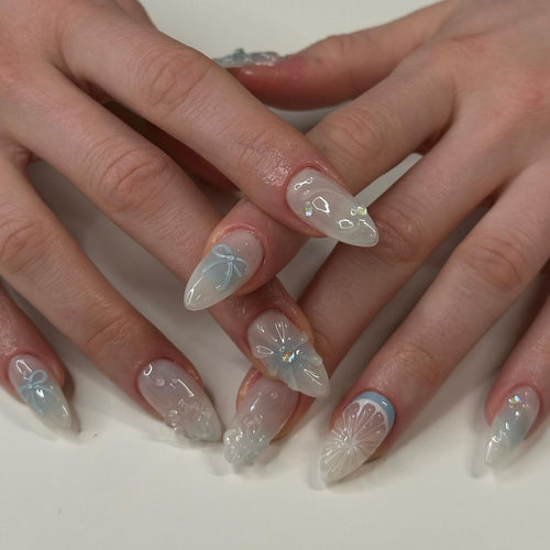 Artificial nail art with floral and decorative elements Bowlift