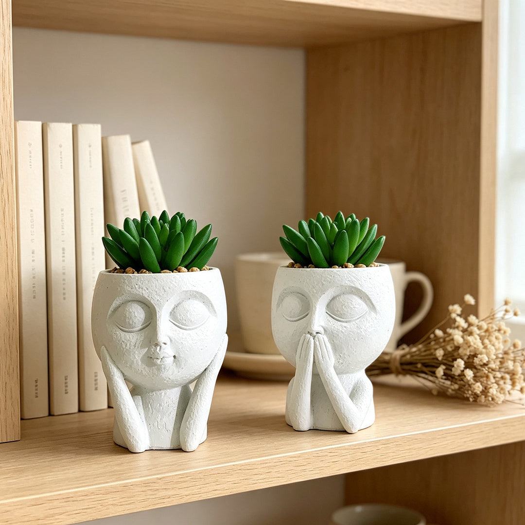 Plant pot with face motif Bowlift