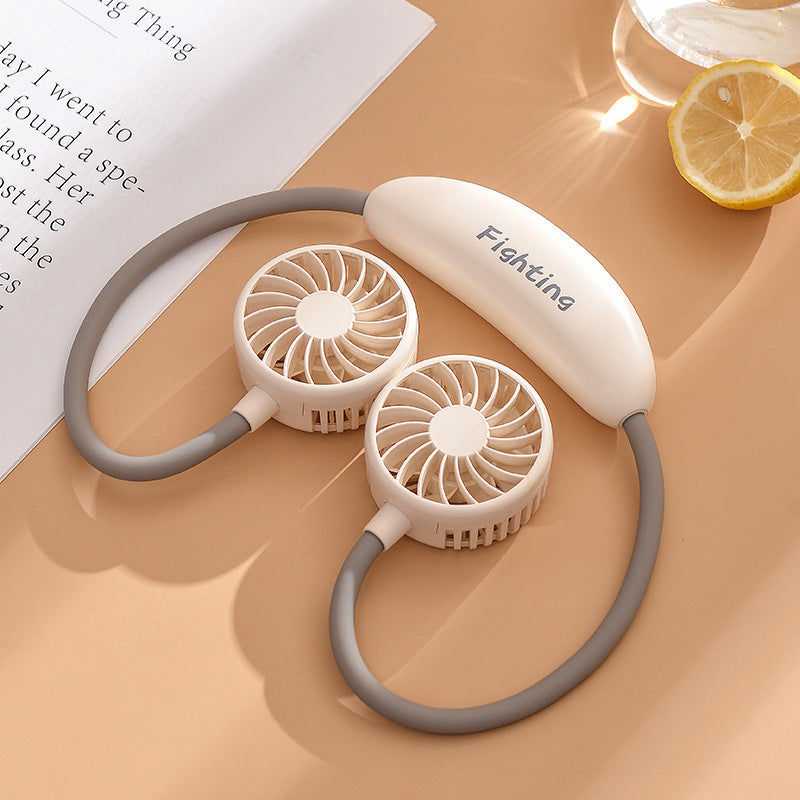Unisex portable neck fan with dual fan heads, flexible neckband, quiet brushless motor, and USB charging function Bowlift