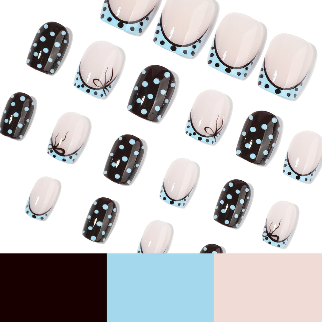 Artful nail extensions with playful dots and elegant design Bowlift