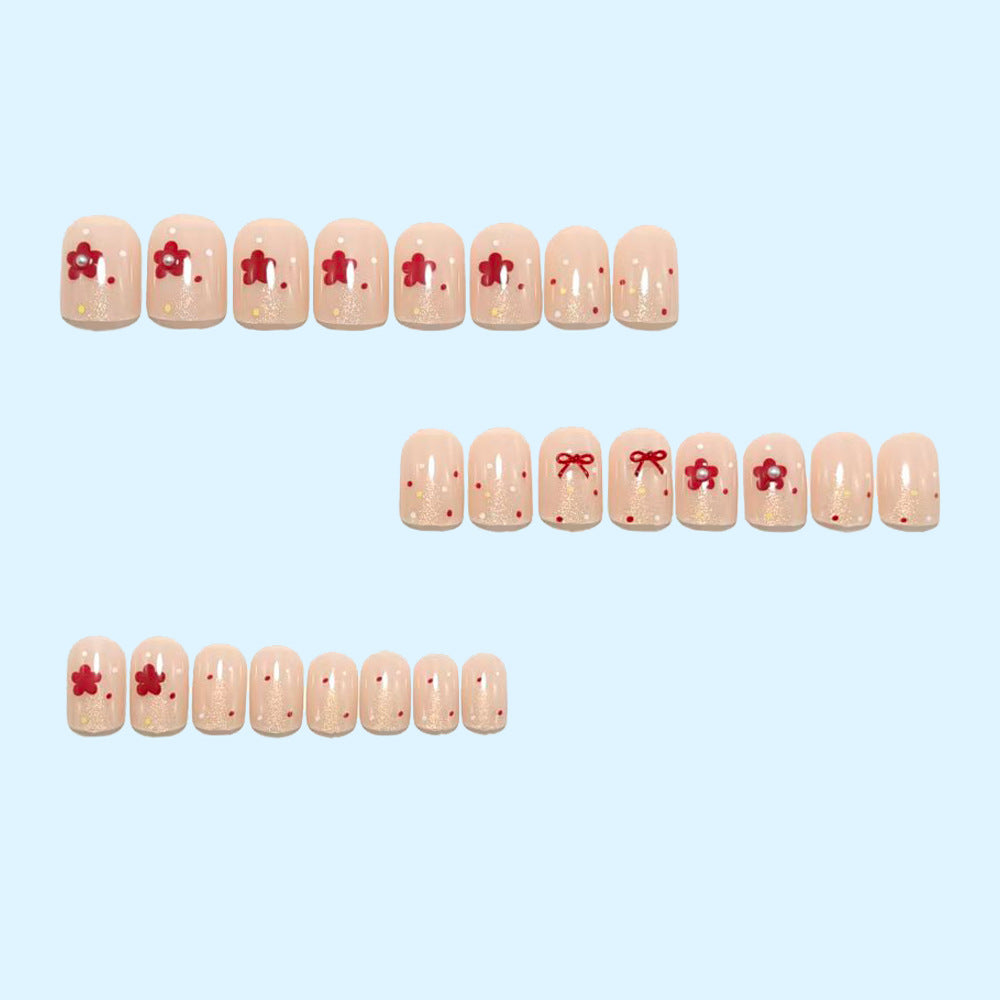Festive artificial nails with delicate Christmas motifs Bowlift