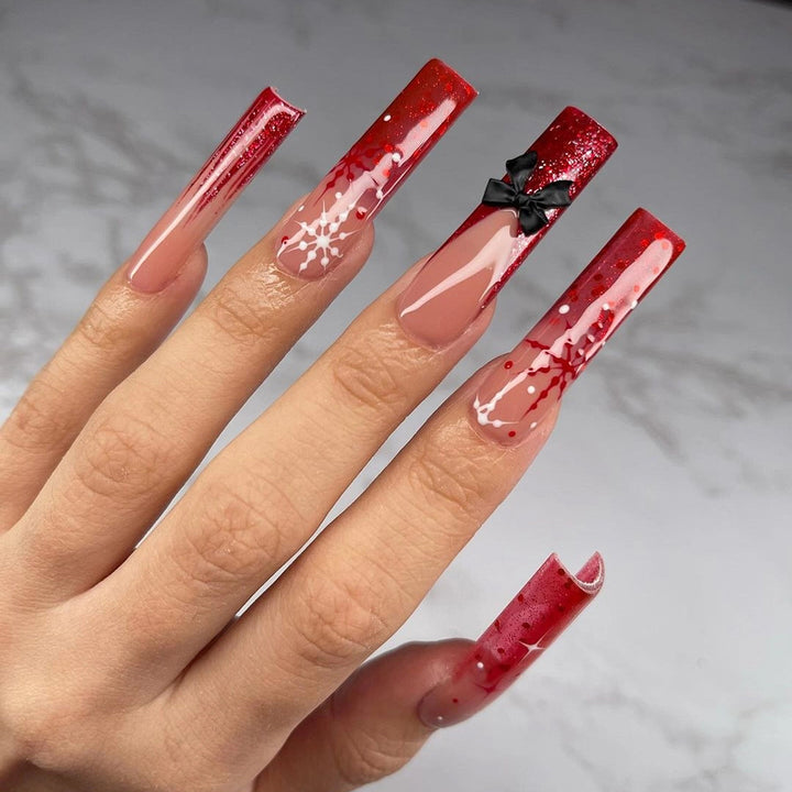 Artificial acrylic nails with glitter and Christmas design Bowlift