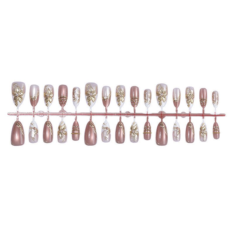 Designer artificial nail set with floral accents and glittering details Bowlift