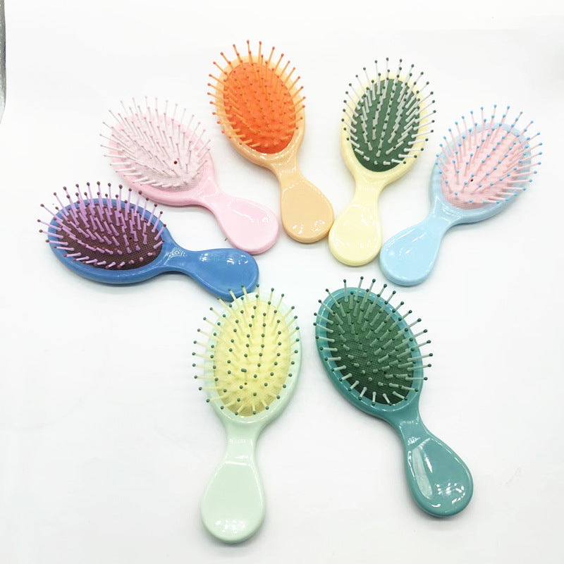 Hair comb with ergonomic handle Bowlift
