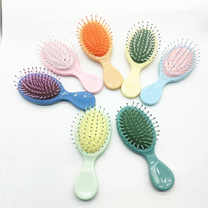 Hair comb with ergonomic handle Bowlift