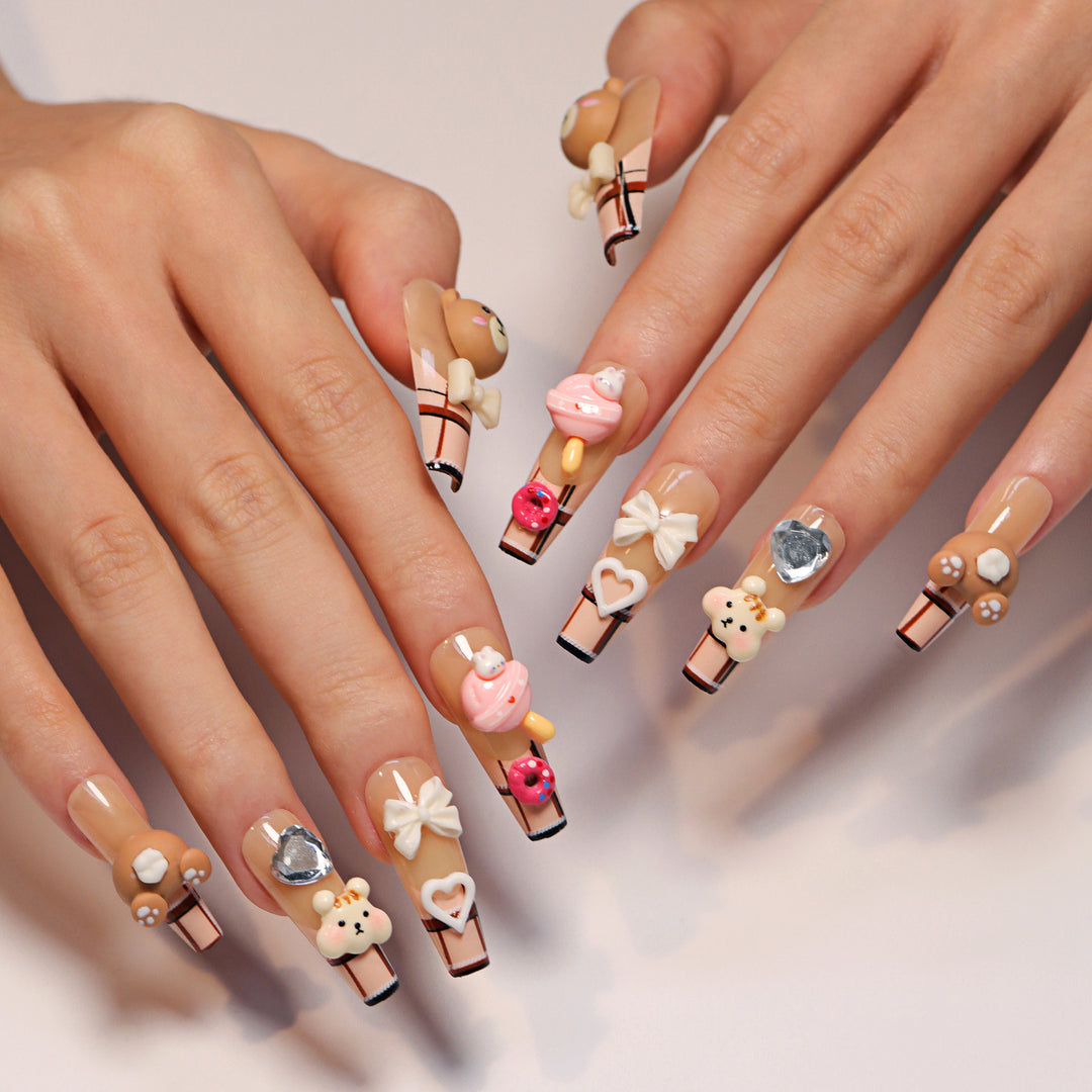 Artificial nail art with cute animal and candy motifs Bowlift