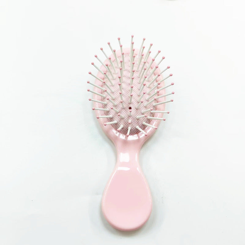 Hair comb with ergonomic handle Bowlift