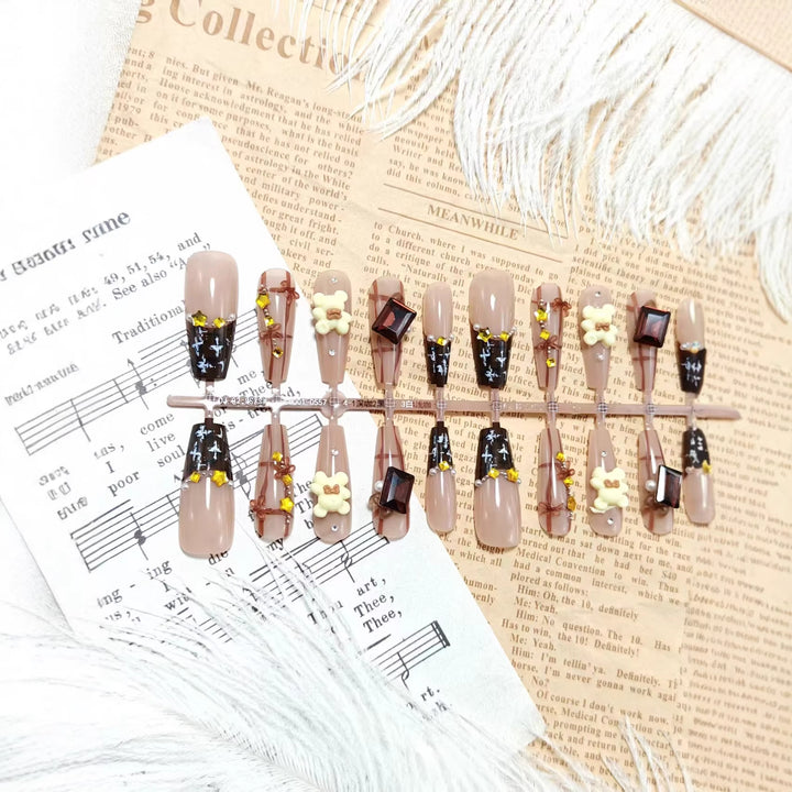 Artificial nails with living bear and gemstone accent Bowlift