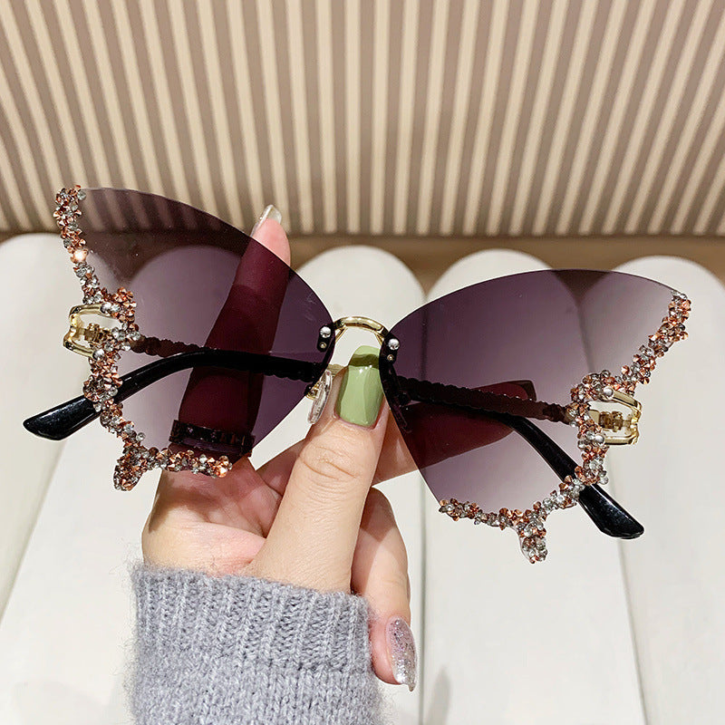 Women's extravagant sunglasses with sparkling butterfly design Bowlift