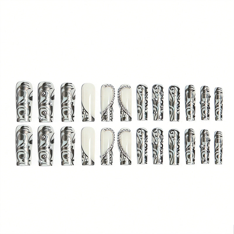 Elegant artificial nails with stylish embellishments Bowlift