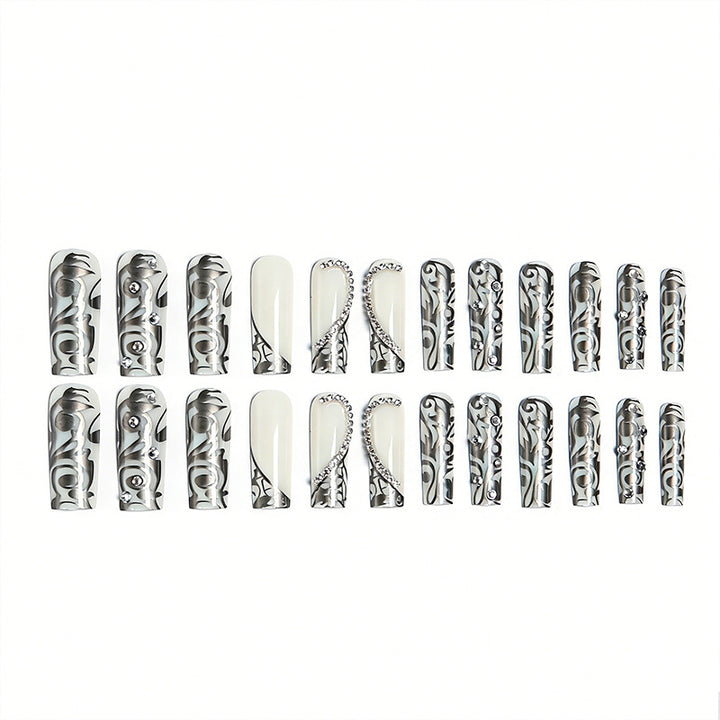 Elegant artificial nails with stylish embellishments Bowlift