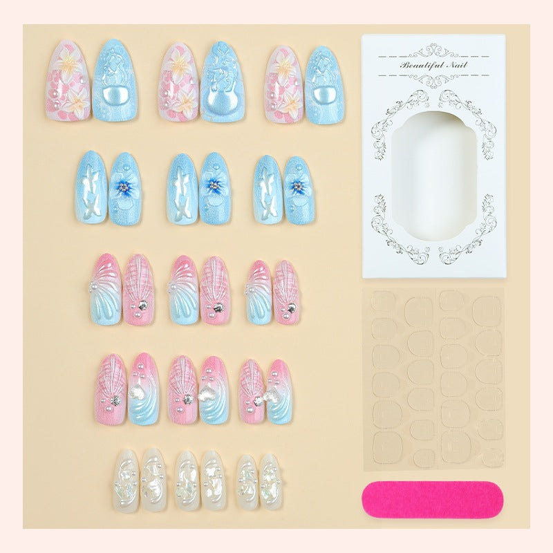 Artificial nail set with creative floral and glittering accents Bowlift