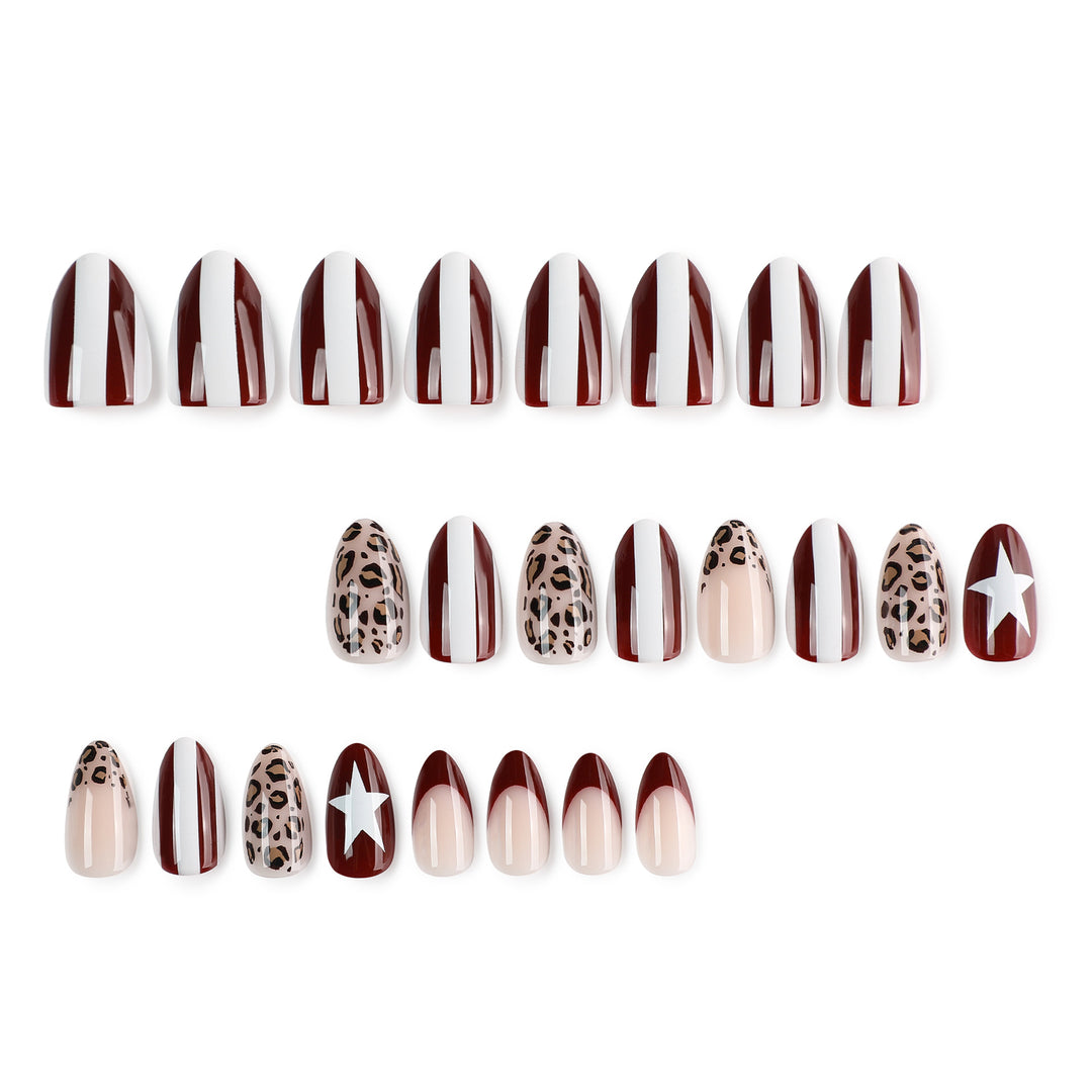 Artful stiletto nails with leopard pattern and elegant glitter decoration Bowlift