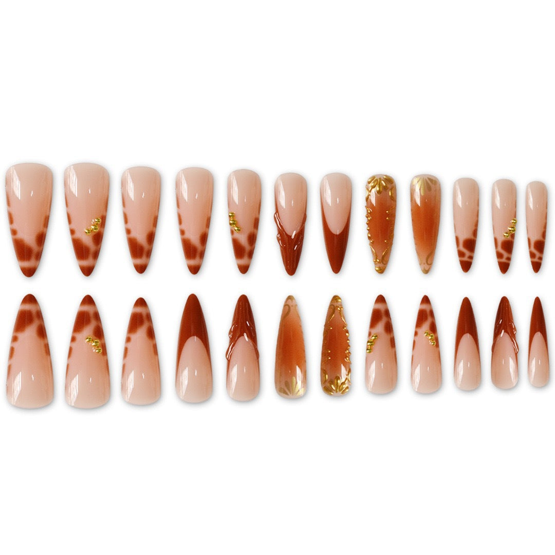 Elegant Stiletto Nail Art Enhancements with Artistic Details Bowlift