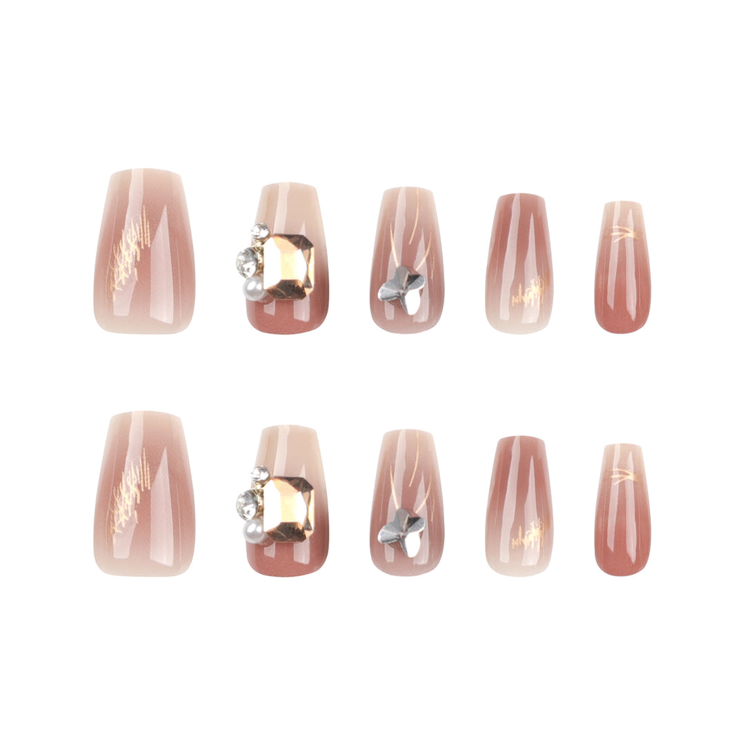 Artificial nail art with elegant jewelry accents Bowlift