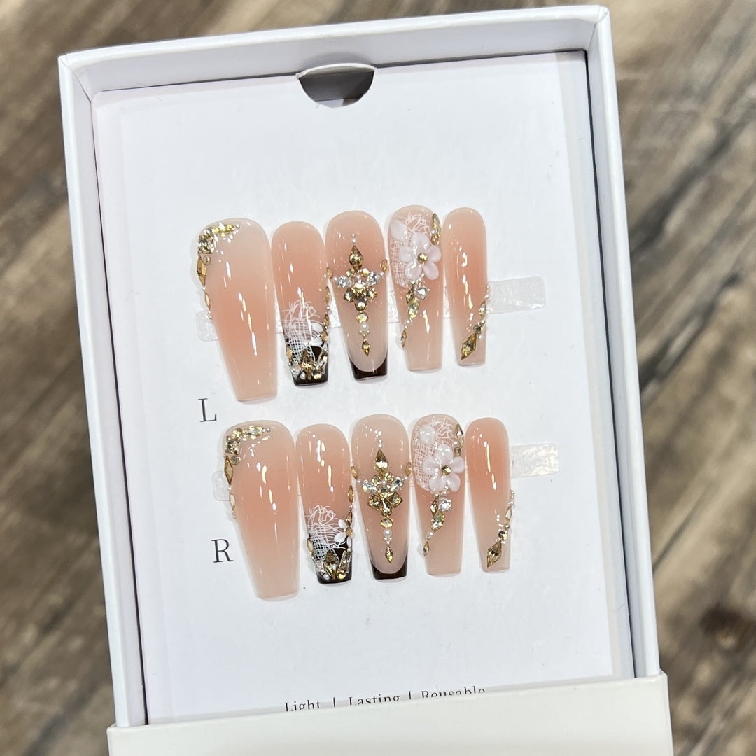 Artistic Reusable Press-On Nail Set with Floral and Gold Accents Bowlift