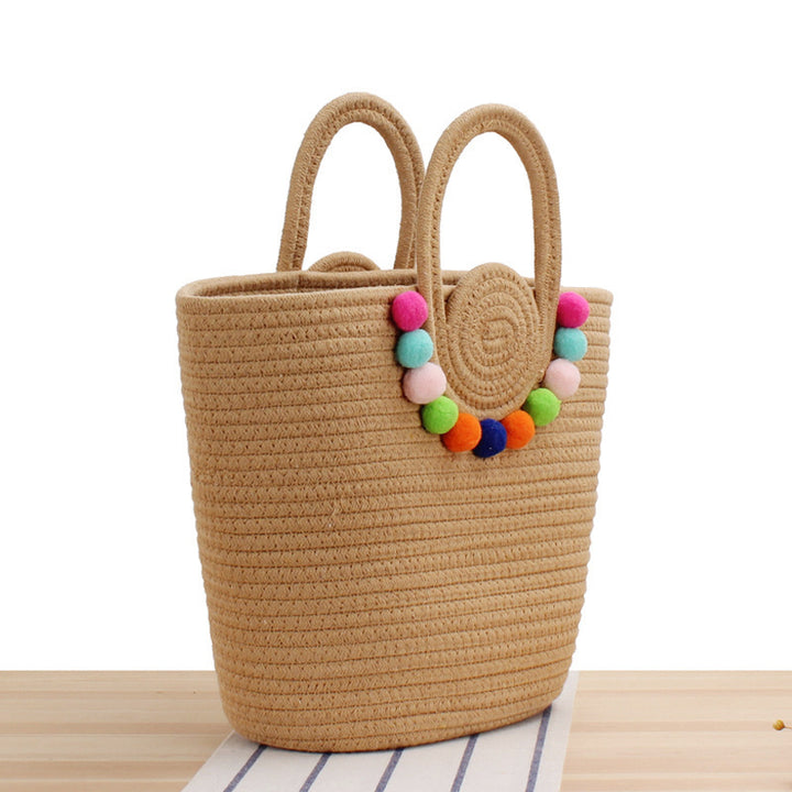 Fashionable handbag with playful pompom decoration Bowlift