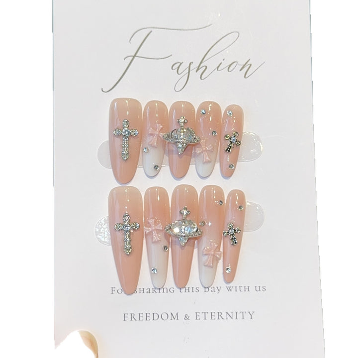 Acrylic nails with rhinestone embellished accents Bowlift