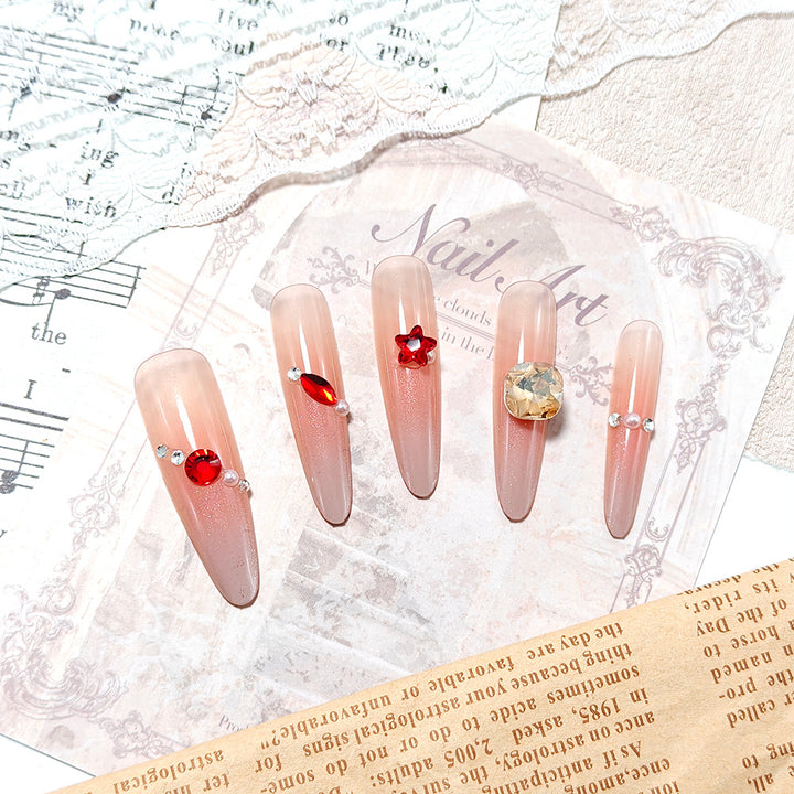 Sparkling artificial nails with decorative rhinestones Bowlift