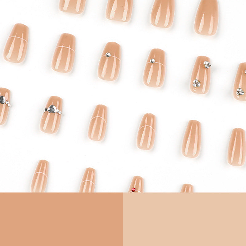 Glamorous nail art with rhinestone embellishment Bowlift