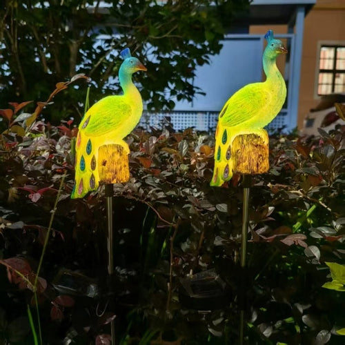 Solar-Powered Resin Peacock Garden Stake Lights With LED Glow And Weatherproof Metal Stakes Bowlift