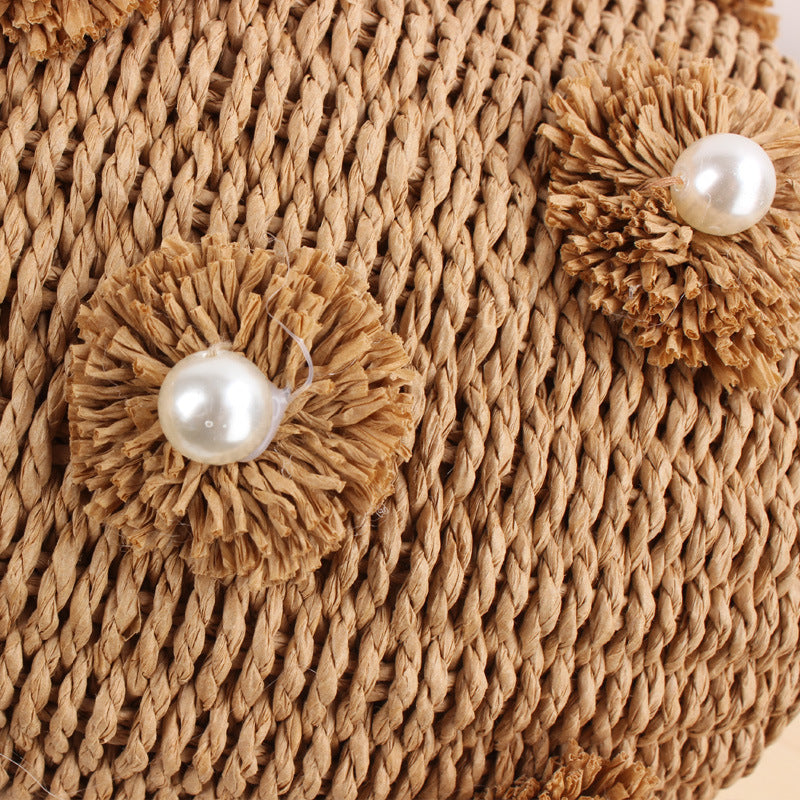 Handcrafted basket bag with bead appliqués Bowlift