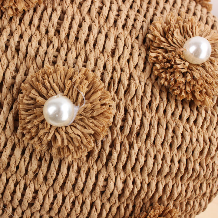 Handcrafted basket bag with bead appliqués Bowlift