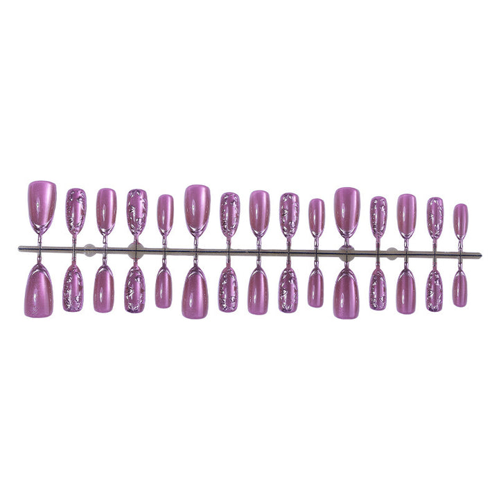 Elegant artificial nail set with shimmering accents and decorative designs Bowlift