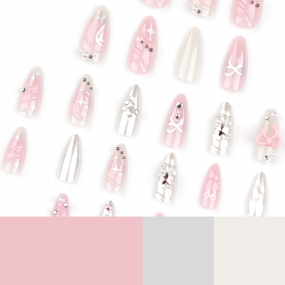 Artful stiletto nails in an elegant design with creative embellishments Bowlift