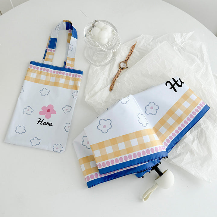 Ladies collapsible umbrella with playful floral pattern Bowlift