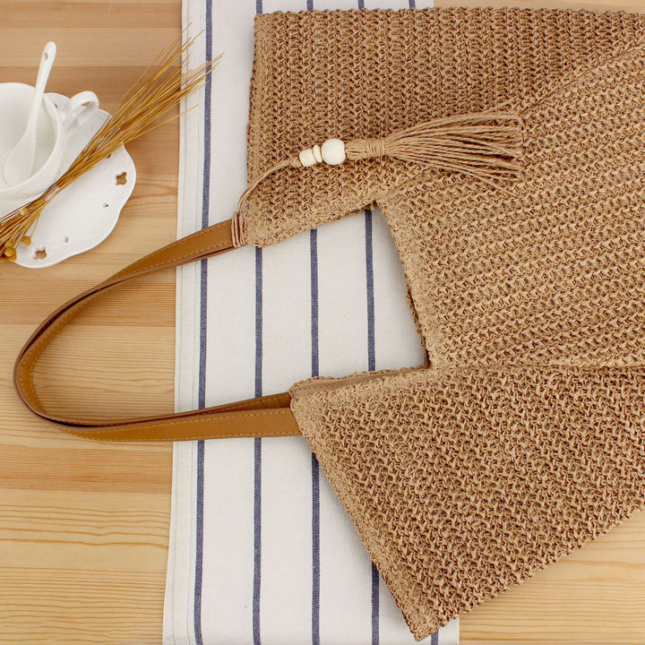 Handbag Made of Handwoven Raffia with Elegant Leather Accents Bowlift