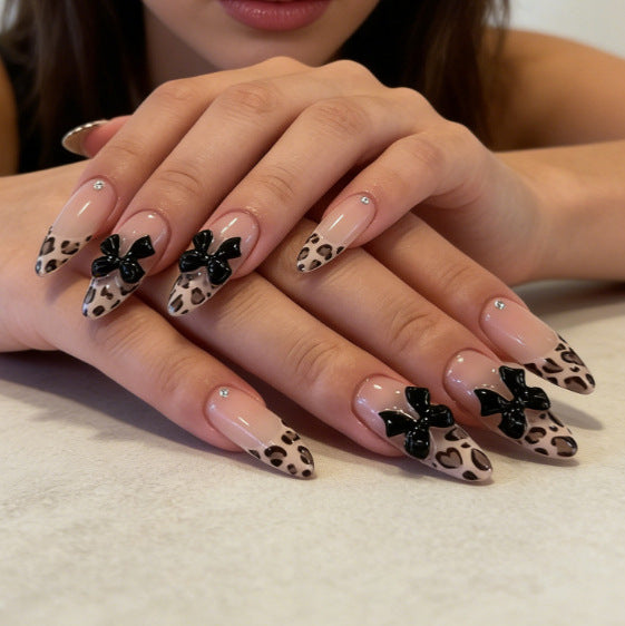 Artistic Press-On Nail Set with Leopard Print and Bow Accents Bowlift