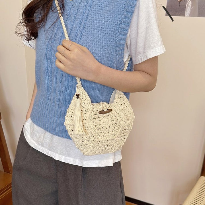Hand-knotted shoulder bag with tassels Bowlift