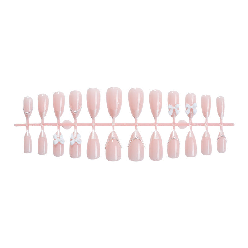 Decorative Press-On Nail Art Set with Elegant Bow and Pearl Accents Bowlift