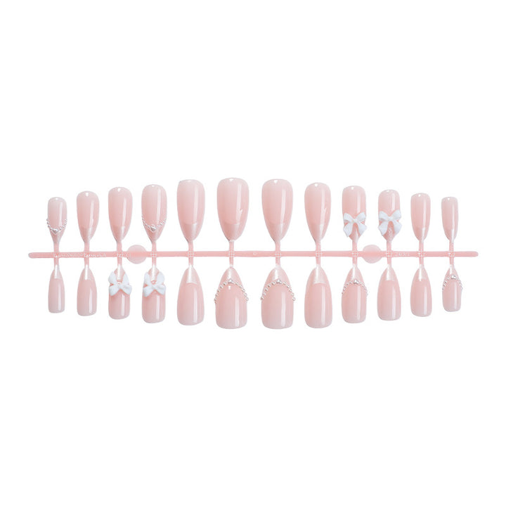Decorative Press-On Nail Art Set with Elegant Bow and Pearl Accents Bowlift