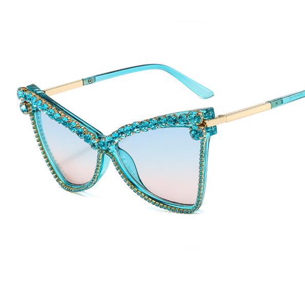 Ladies extravagant oversized sunglasses with gemstones Bowlift
