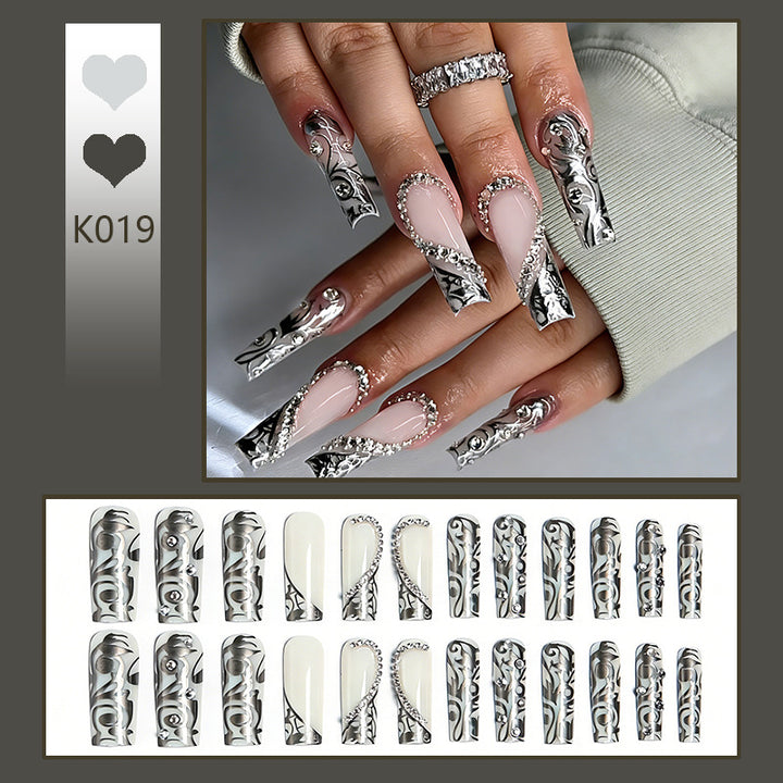 Elegant artificial nails with stylish embellishments Bowlift