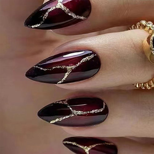 Elegant artificial nails with golden accents Bowlift