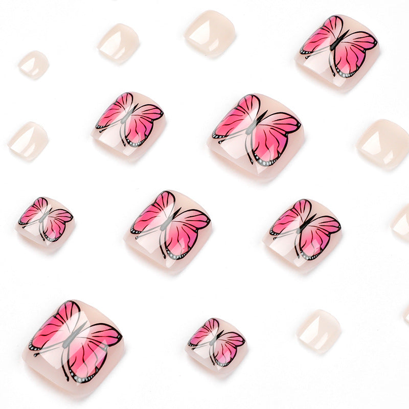 Artful toenail design with butterfly design Bowlift