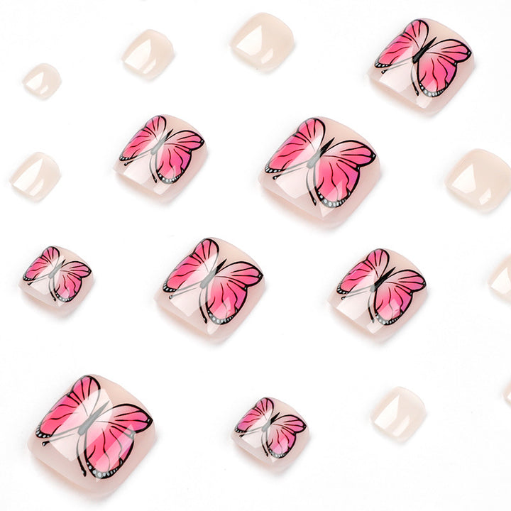Artful toenail design with butterfly design Bowlift