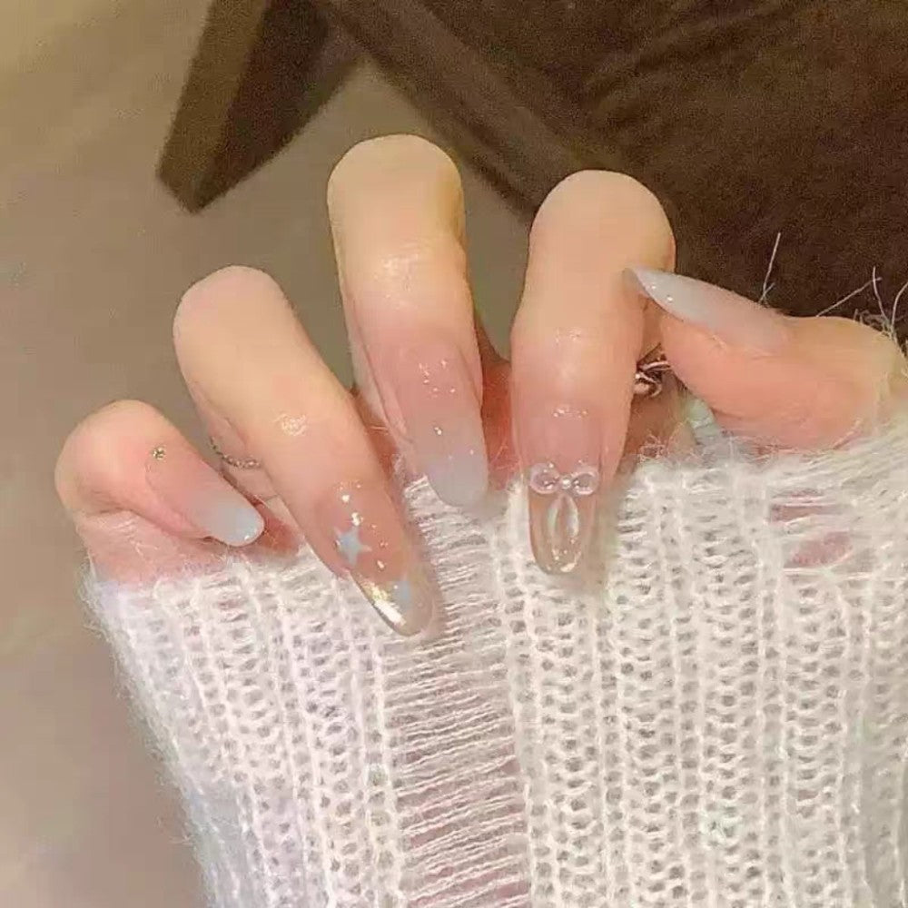 Artistic Press-On Nail Set with Glitter and Floral Accents Bowlift