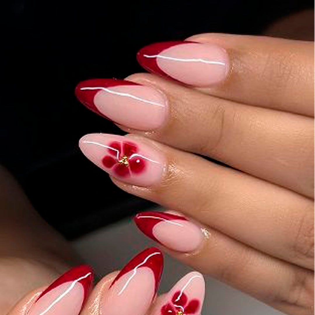 Elegant and artistically designed stiletto nails with flower design Bowlift