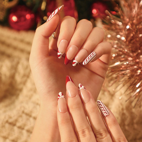 Elegant artificial nails in festive winter design Bowlift