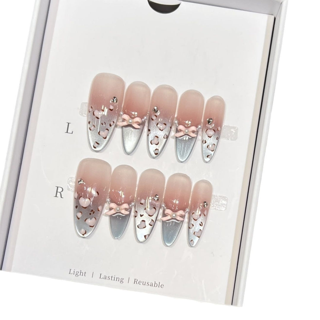 Decorative Press-On Nail Design with Bow Accents Bowlift