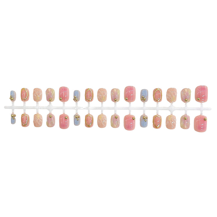 Decorative Press-On Nail Set with Gold Accents Bowlift