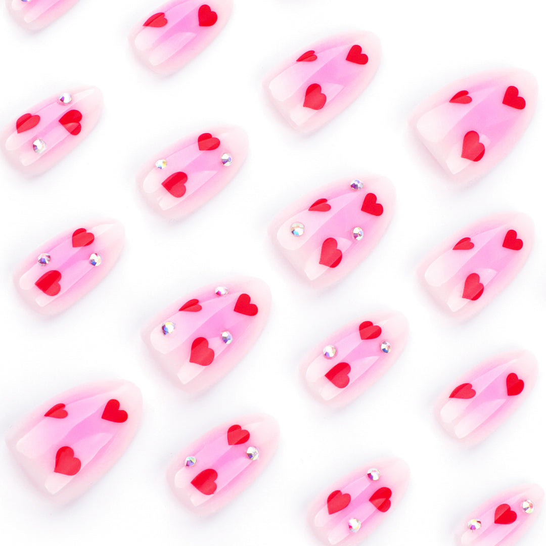Artful nail art with heart motifs and glamorous details Bowlift