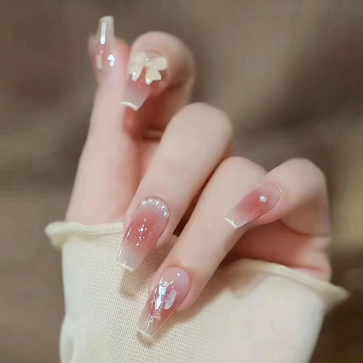 Glamorous artificial nails with sparkling accents Bowlift