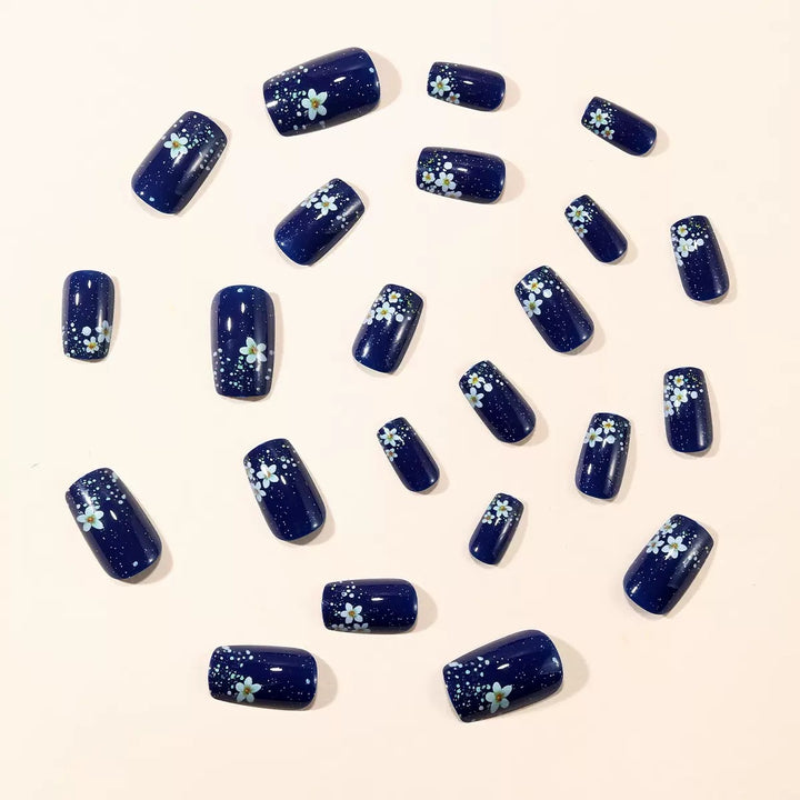 Acrylic nail set with elegant flower design and glitter accents Bowlift