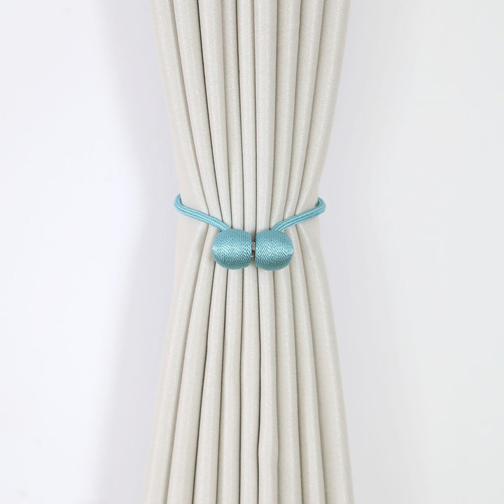 Decorative curtain tieback Bowlift